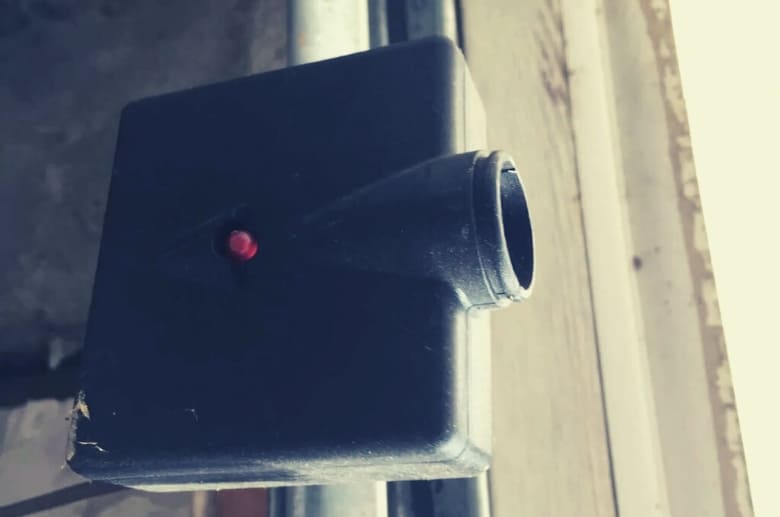 A Genie garage door sensor blinking red might mean it is misaligned.