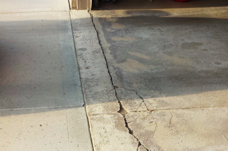 Floor chipping can happen during garage door spring accidents.