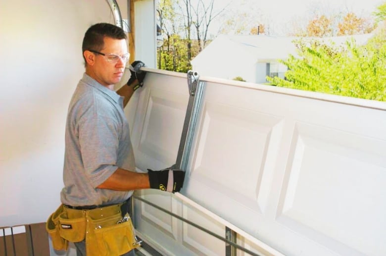 Hire a garage door technician to avoid garage door spring danger.