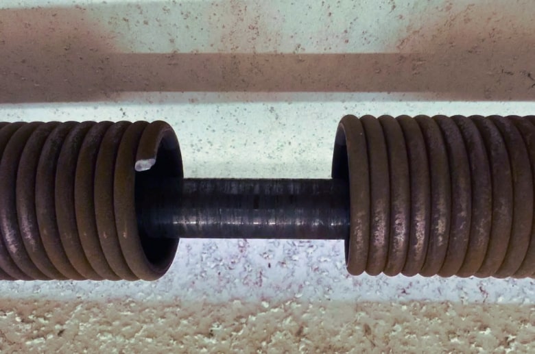 A broken spring is one of the main reasons when a garage door won’t open all the way.