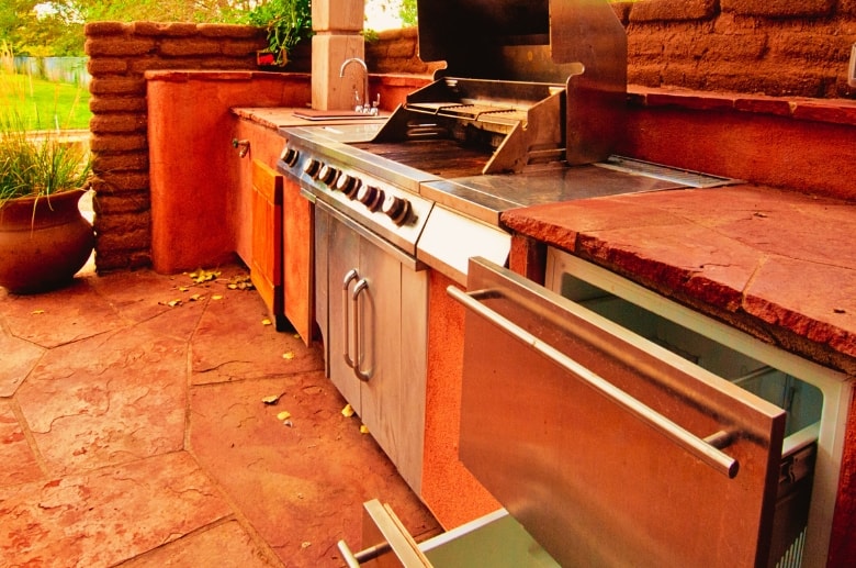 A natural gas grill in the an outdoor kitchen. It can also be used when grilling in garage. 