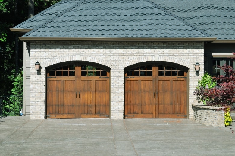 A carriage house panel garage door. It is one of the garage door types.