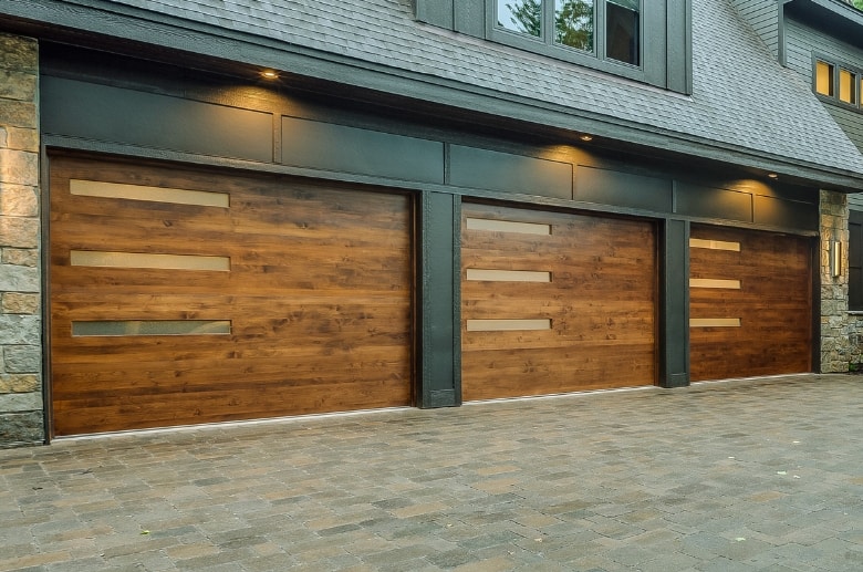 A wood panel garage door. It is one of the garage door types.