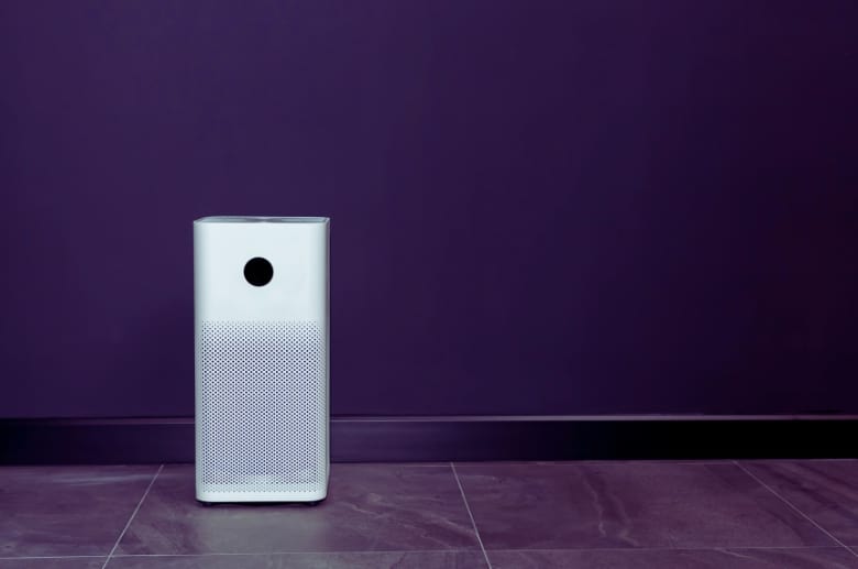A portable air purifier. It is one of the options for residential garage ventilation
