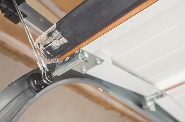 A garage door track. How Do I know If My Garage Door Springs Need To Be Replaced? Check the tracks if they are crooked or any slight movement.