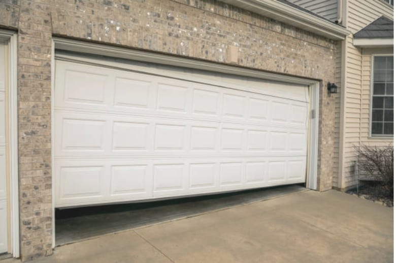 An unbalanced garage door. How Do I know If My Garage Door Springs Need To Be Replaced? An unbalanced garage door is one of the signs.