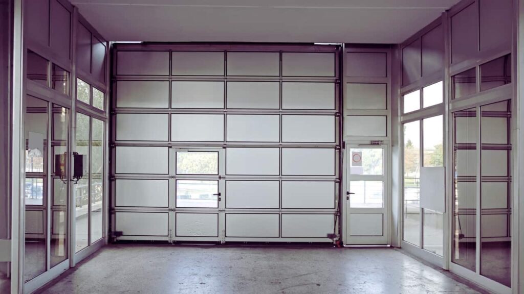 A converted garage door to an entry door.