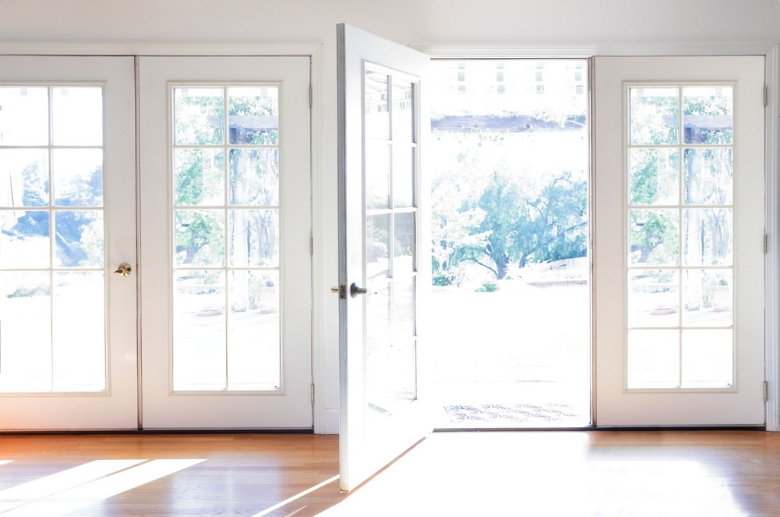 French doors with light shining through.